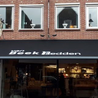 knikarmscherm Rhenen reclame bedrukking zonwering Utrecht Wageningen Ede Bennekom